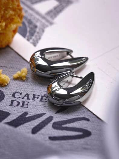 Crest-Ohrringe silbern