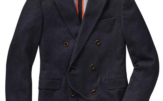 Dunkelblauer, zweireihiger Blazer mit goldenen Knöpfen, drei Pattentaschen und einem leuchtend orangefarbenen Futter.