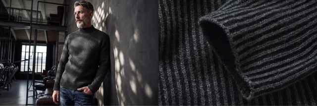 Ein Mann in einem dunklen, gerippten Rollkragenpullover steht drinnen; Nahaufnahme des Stoffes rechts im Bild.
